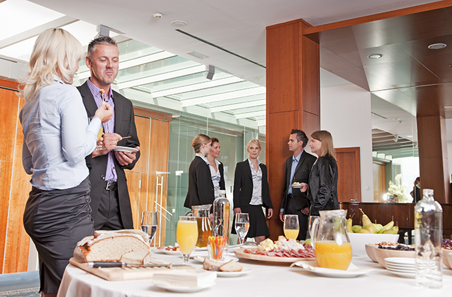 Employees at a corporate breakfast.