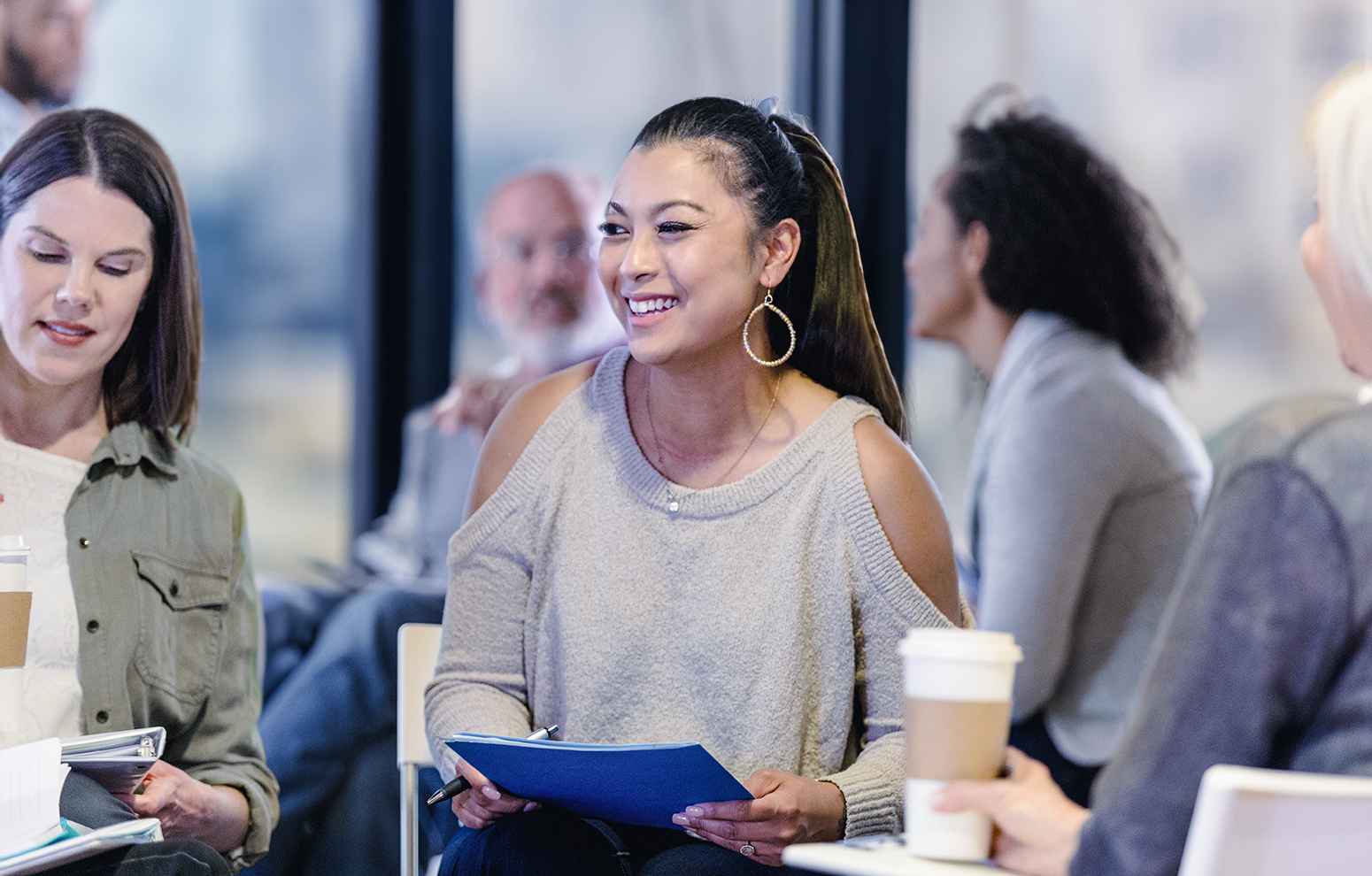 Woman smiling at live event