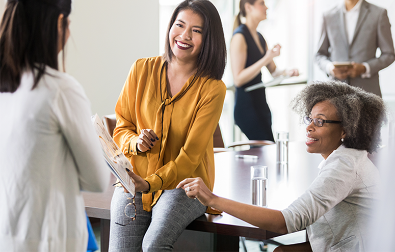 Woman laughing at get-together