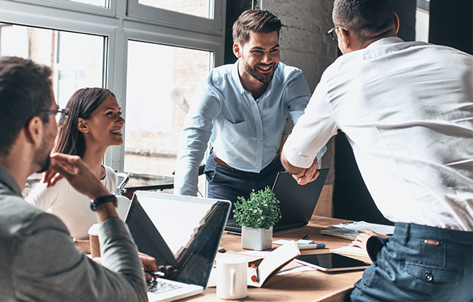 colleagues talk in meeting
