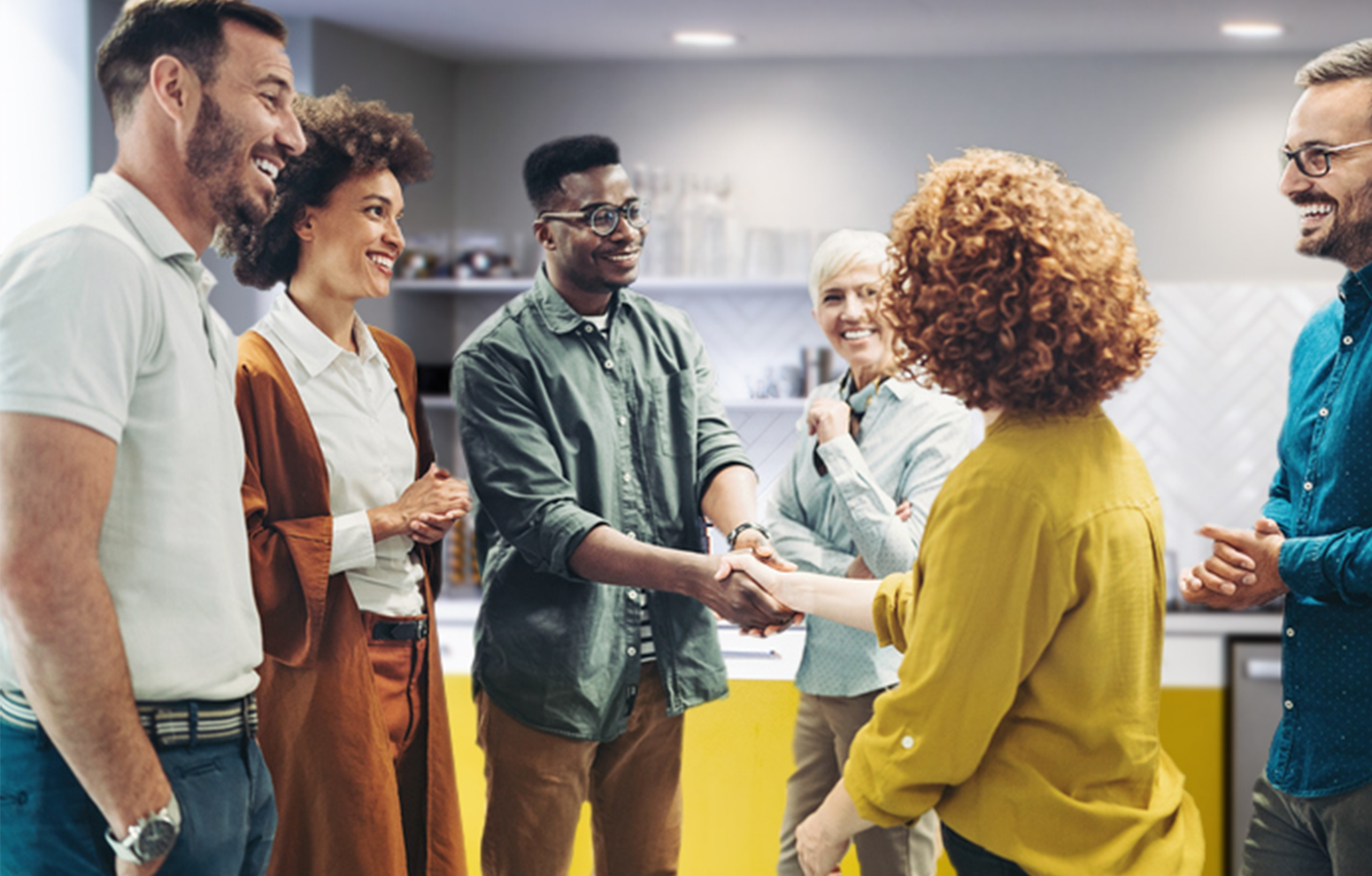 Professionals meet new peers and shake hands