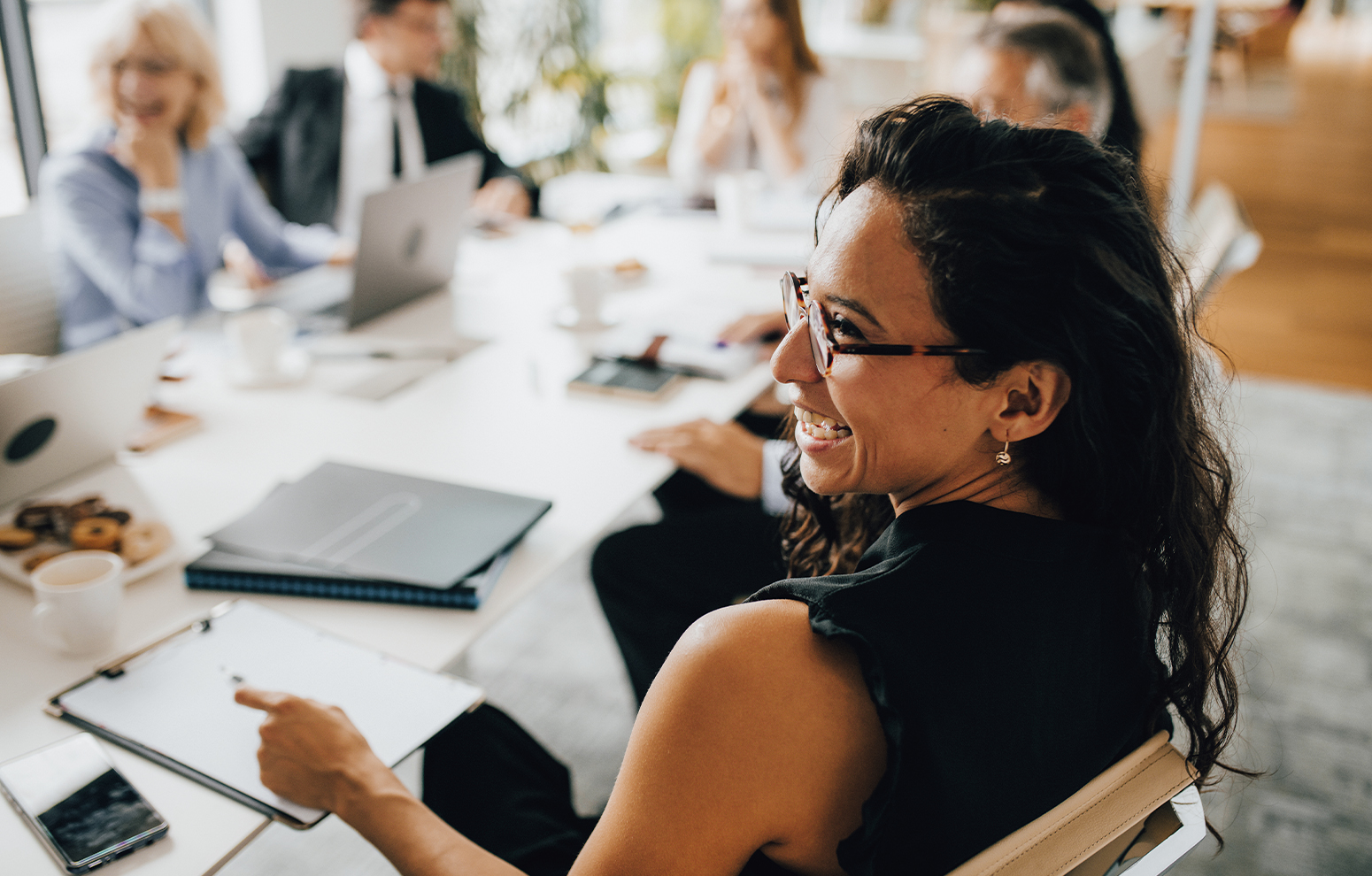 Group of people at a work meeting.