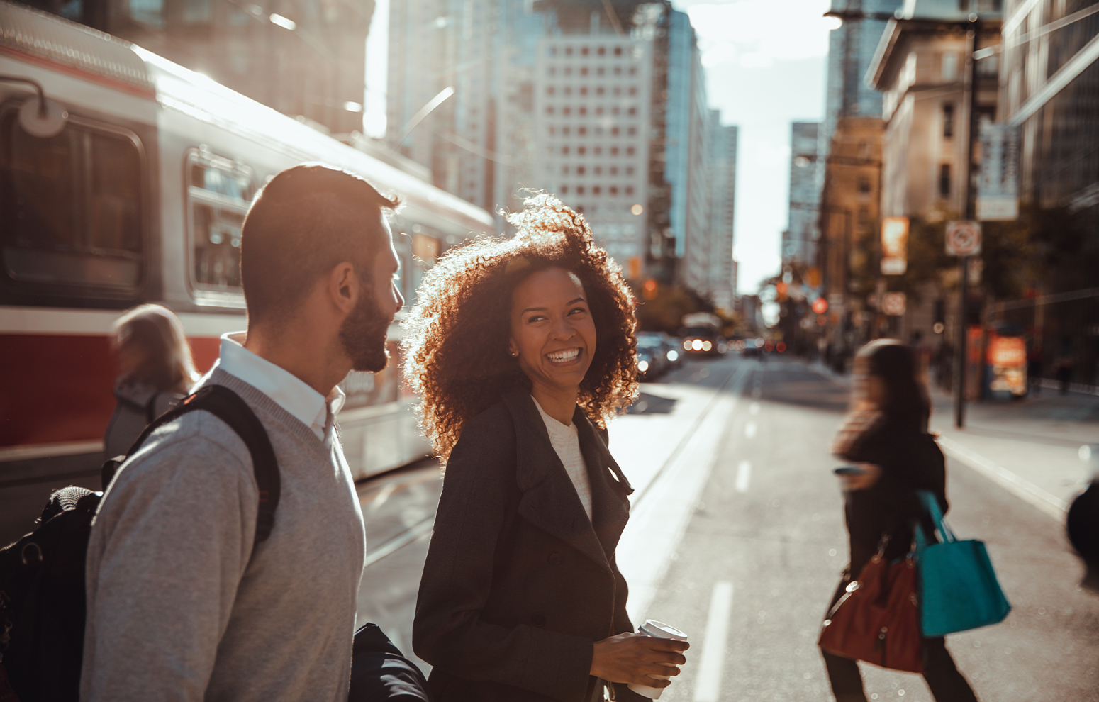 People walking on a city street. 