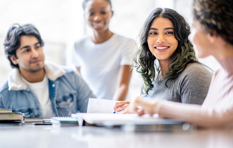 Group of students converse