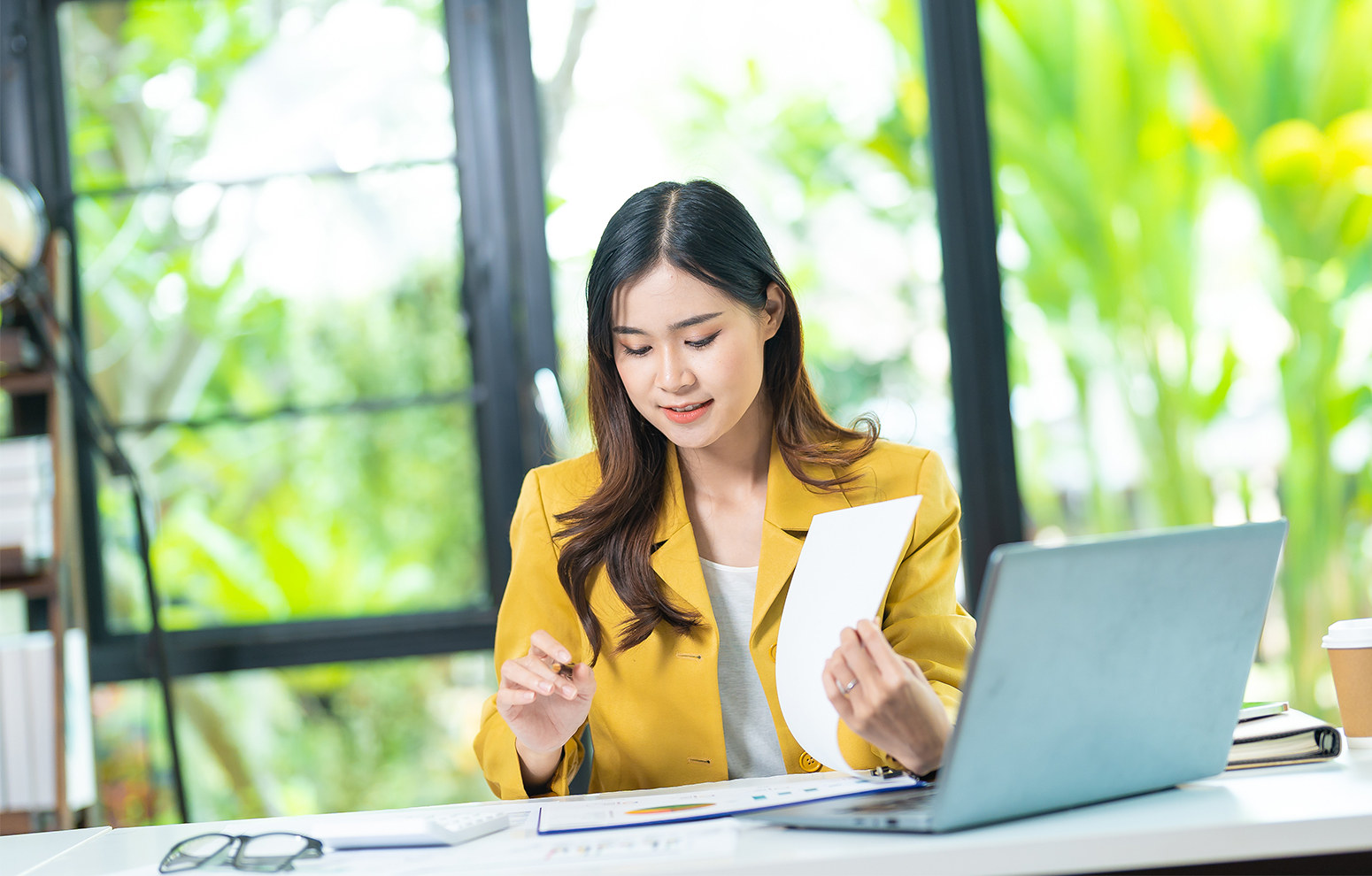 Woman working on computer.