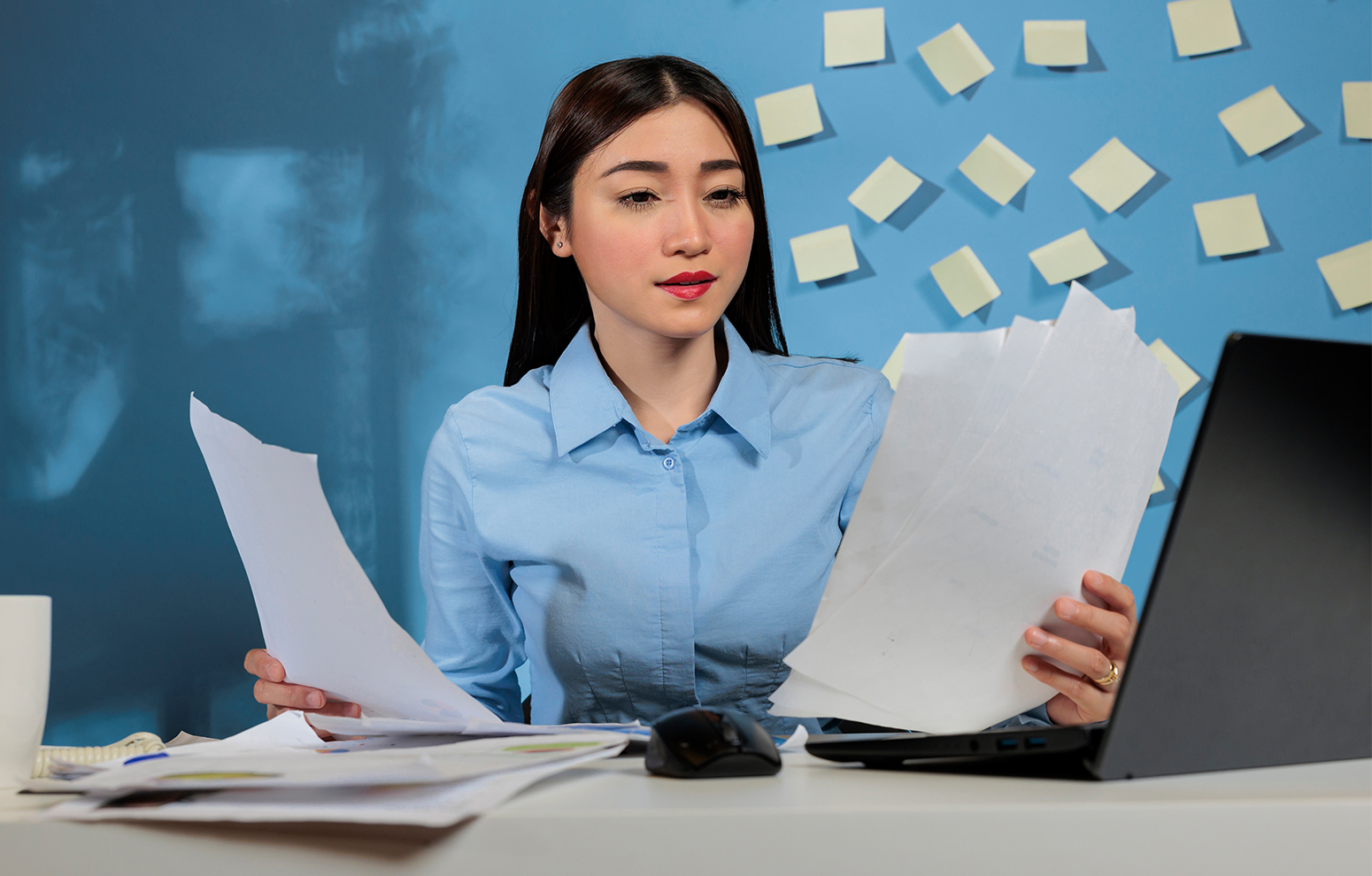 Woman working on computer.