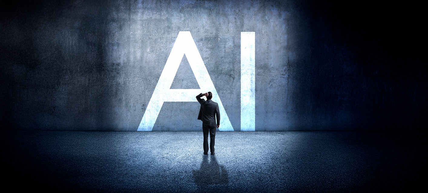 Man on laptop at desk