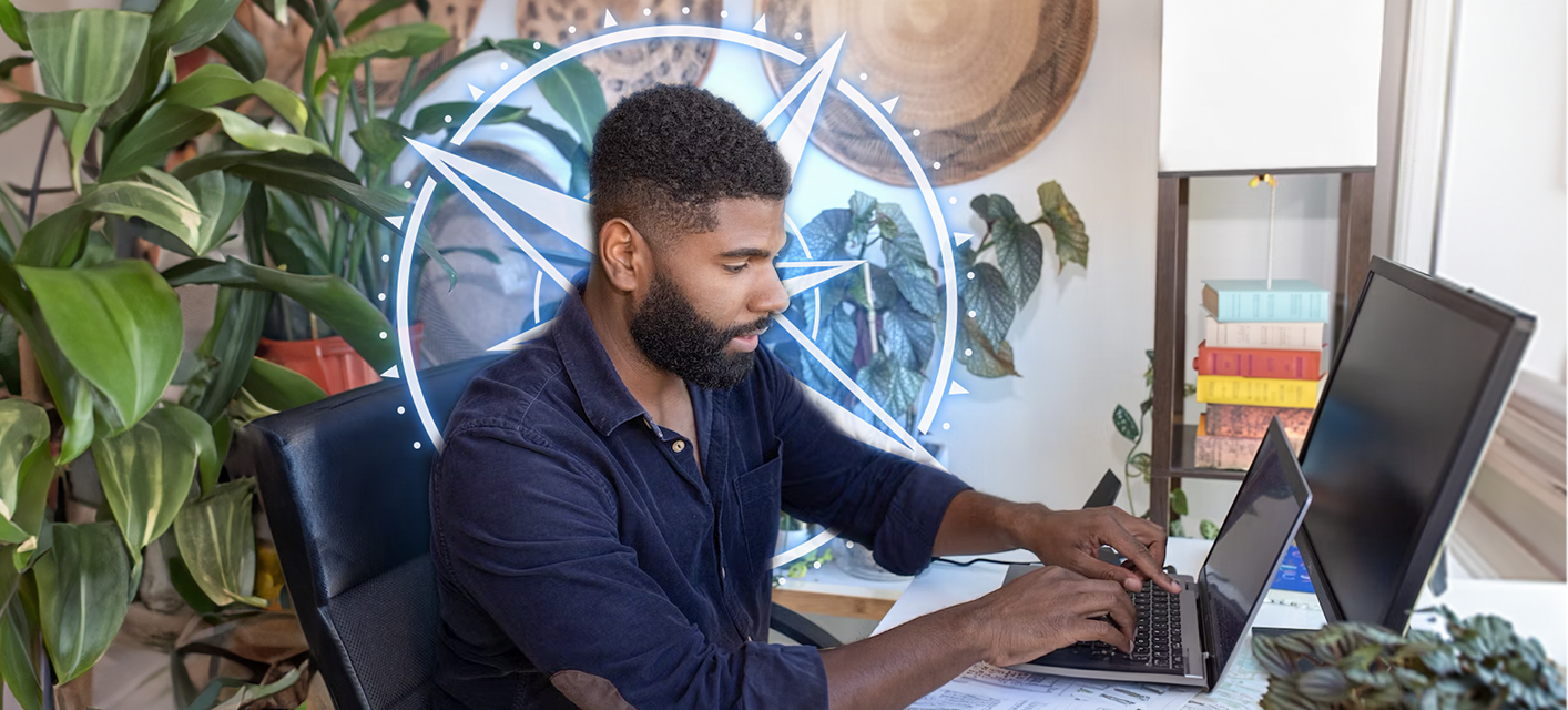 Man on laptop at desk